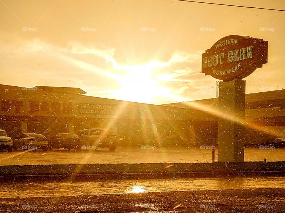 The sun comes out to say hello on a beautiful summer day in Tulsa Oklahoma. Beautiful sunset with no regret 
