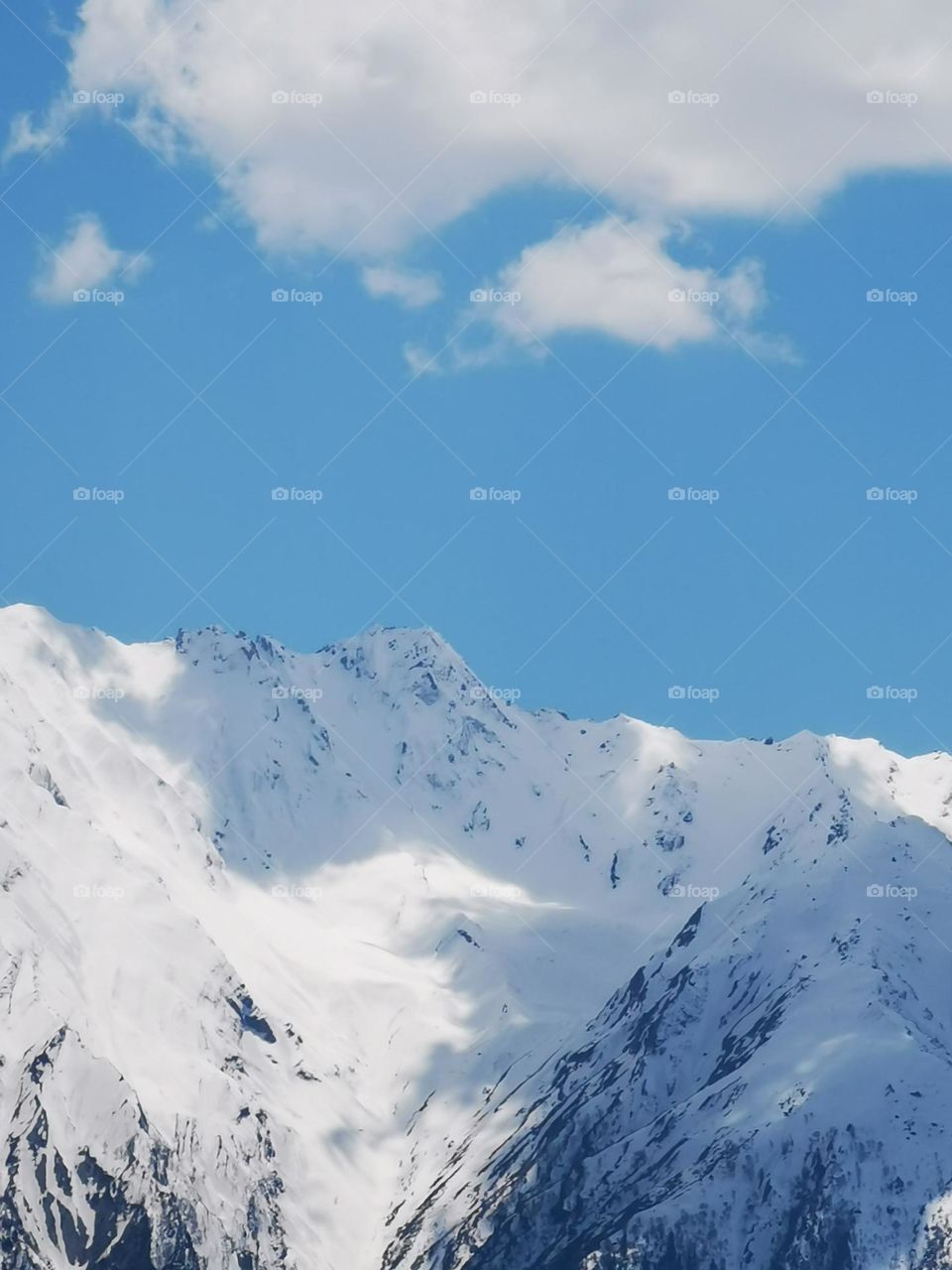 Clouds cover shade on peaks of himalayas mountain