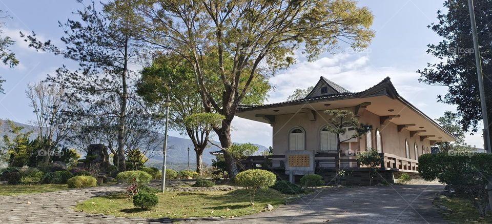 the temple of the sacred buddha in the mountains of the city