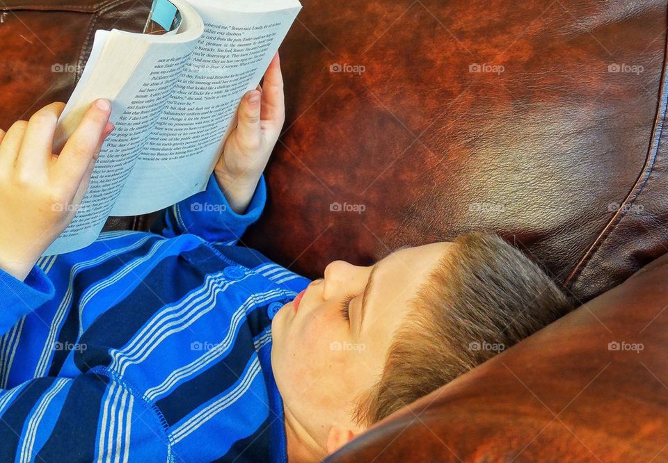 Child reading a book