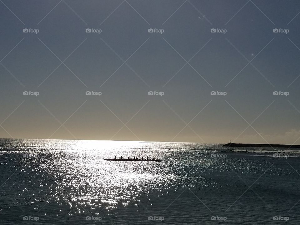 Canoe in Pokai Bay at sunset