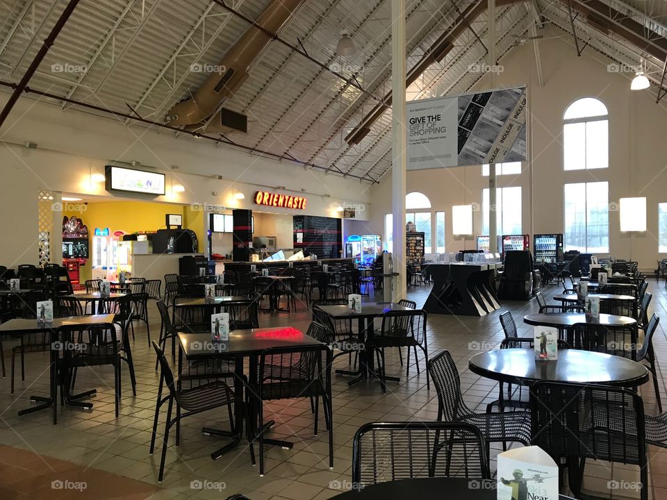 A food court. Located in Lee Premium Outlets, this quaint food court was begging to have it’s picture taken. The chairs are lined up nicely and the pitched roof make it feel spacious.