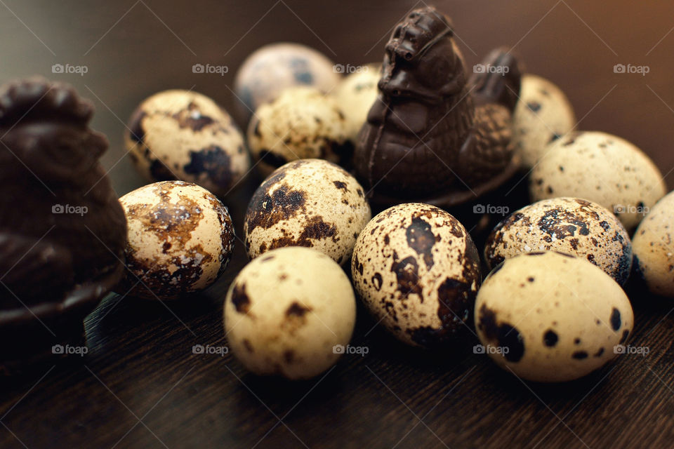 Eggs and chocolate on wooden table