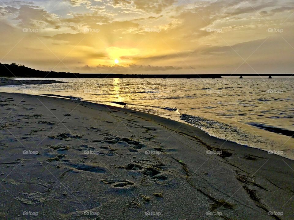 Sunrise on the sandy beach - The light is a gift, bold and free, for anyone who cares to open their eyes in the dawn and watch the world awake