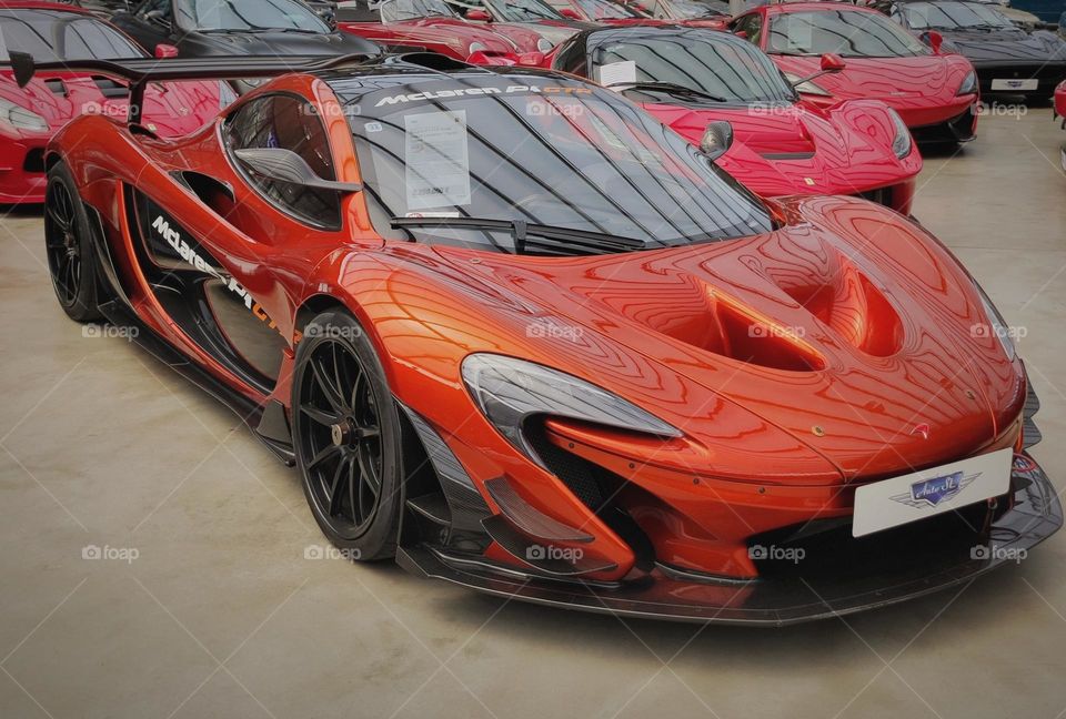 Mcclaren sports car in black and orange / Stunning powerful car / Amazing Mcclaren shot at a car exhibition