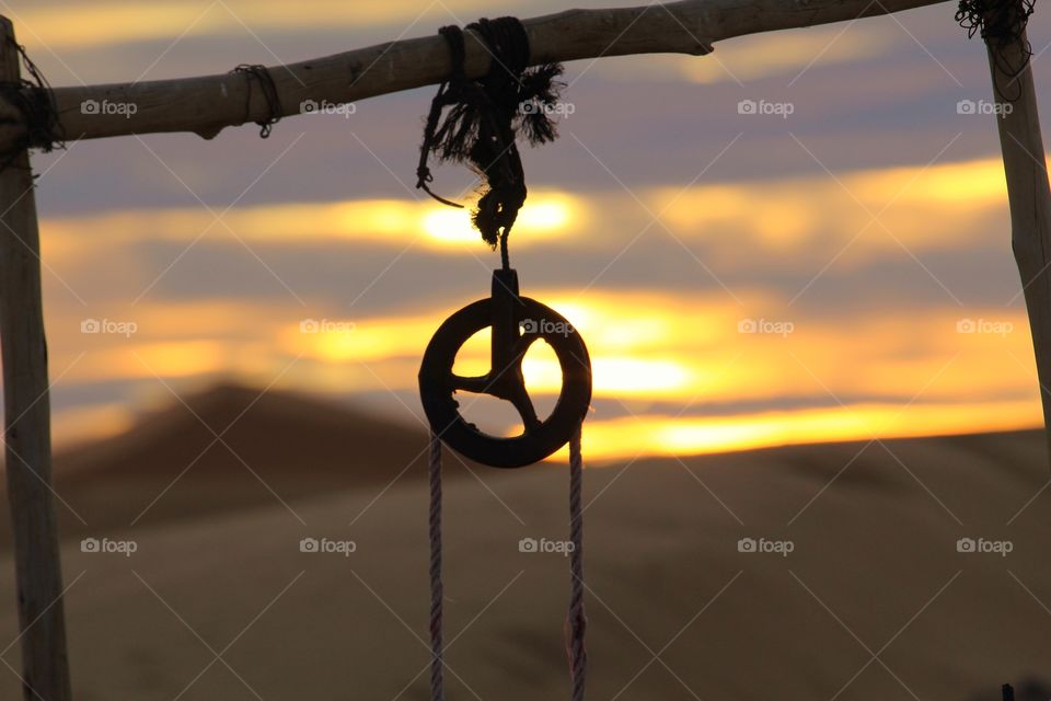 Well in the Sahara at sunrise 