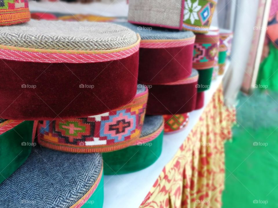 Traditionally Himachali or Himachal Pradesh cap with Green and maroon color. Specially wear by the people of kullu ,Kinnor,lohal spiti Area.