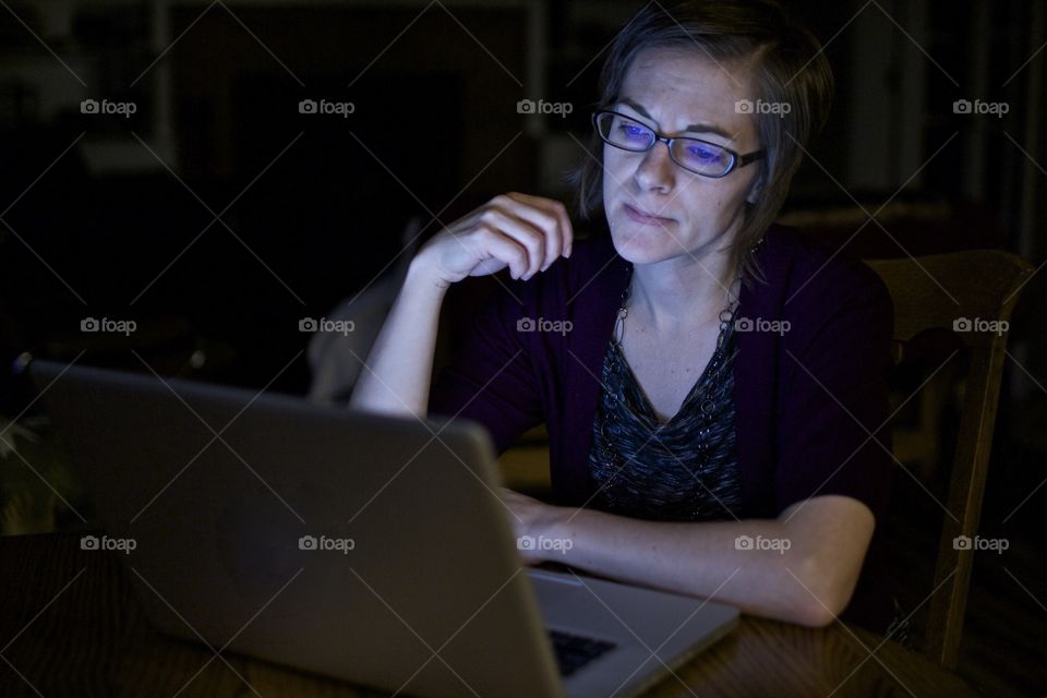 Woman angry at laptop computer. Technology getting a woman down