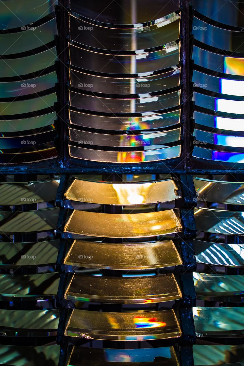 Colorful closeup of the Pigeon Point Lighthouse glass prism First Order Fresnel Lens in pescadero california between Santa Cruz and San Francisco