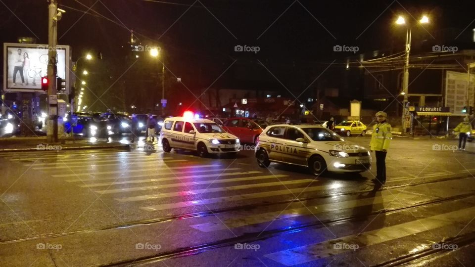 Police Blocking the car traffic on the way to the Victoriei Square during the protests