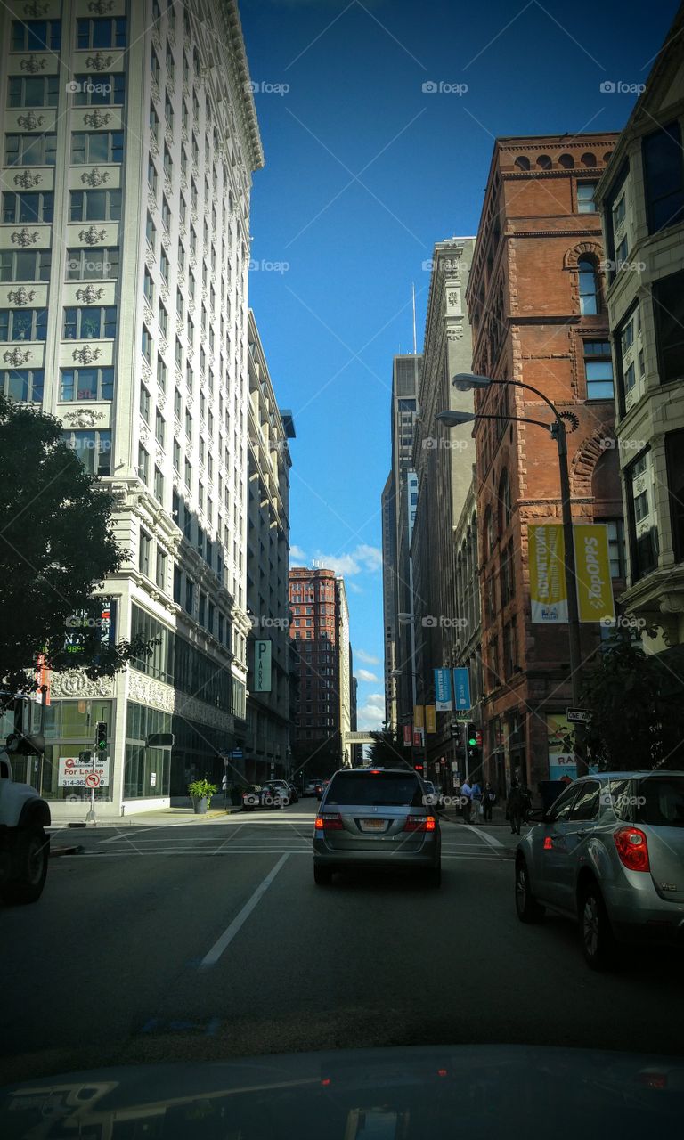 Driving in town today, I snapped this picture on my phone. I am always in awe of the magnificent buildings and structures that line these St Louis Streets. Some of them are tall, some are ornately decorated, some are all glass. They are all interesting.