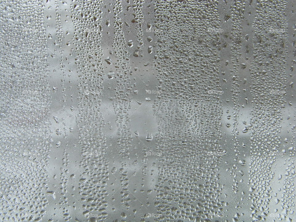 Water drops on window glass after rain