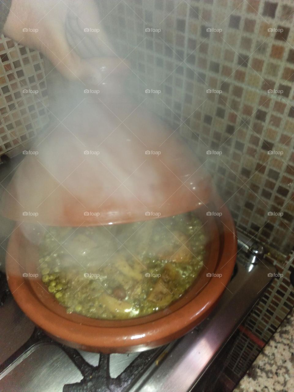 a smoke coming from moroccan Tajine.