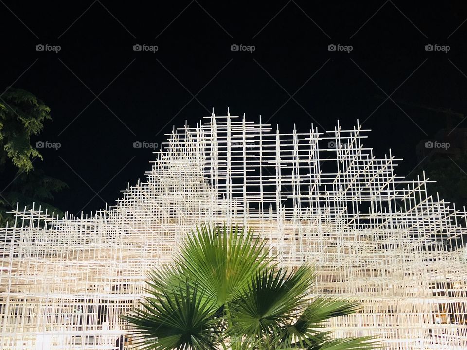 Futuristic architecture palm night lights