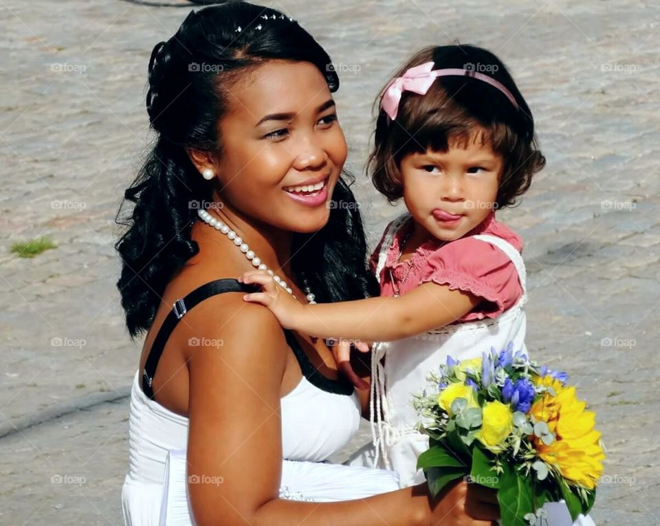 Bride with her little daughter