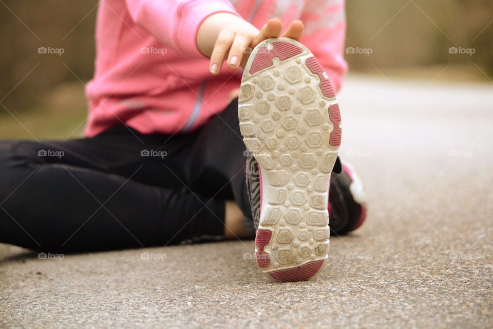 Close-up of women stretching