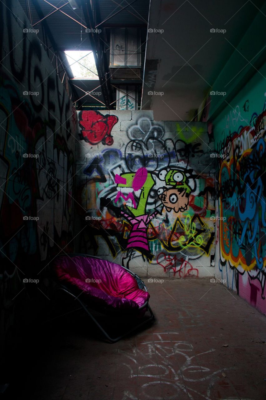 Abandoned graffiti lounge room