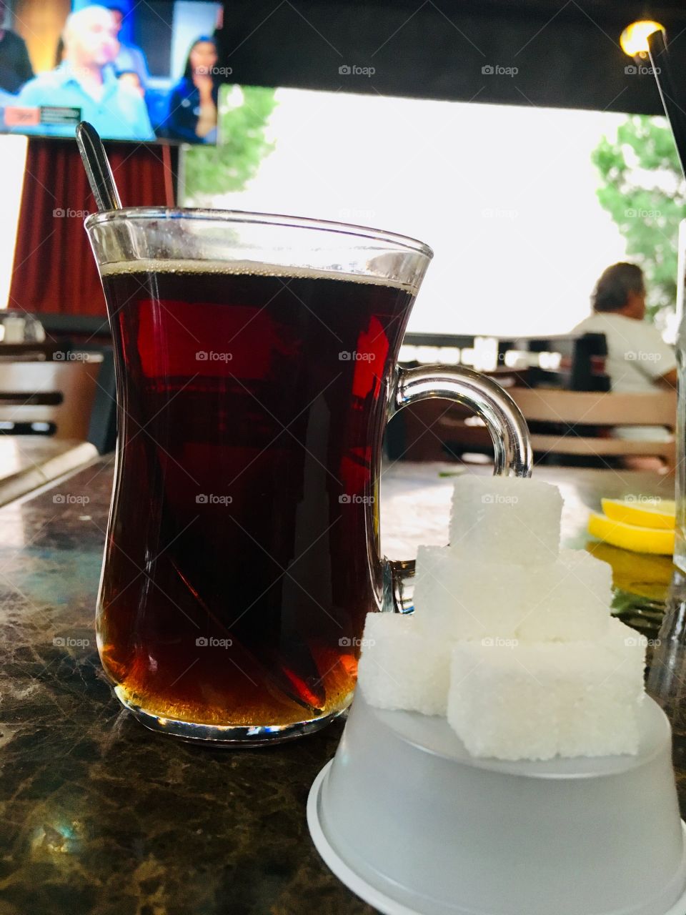 Pyramid of sugar cubes and Turkish tea