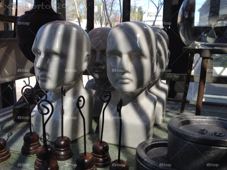 Glass heads for sale at local shop