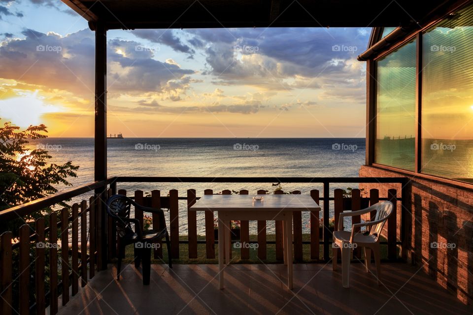 Reflection of beautiful sunset over the Black Sea and colourful sky at Fitchoza beach near Varna, Bulgaria
