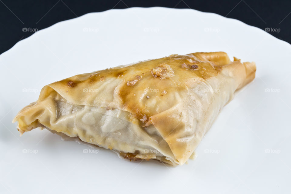 Baklava - Homemade sweet cookie or cake. It have a walnuts inside. Healthy food.