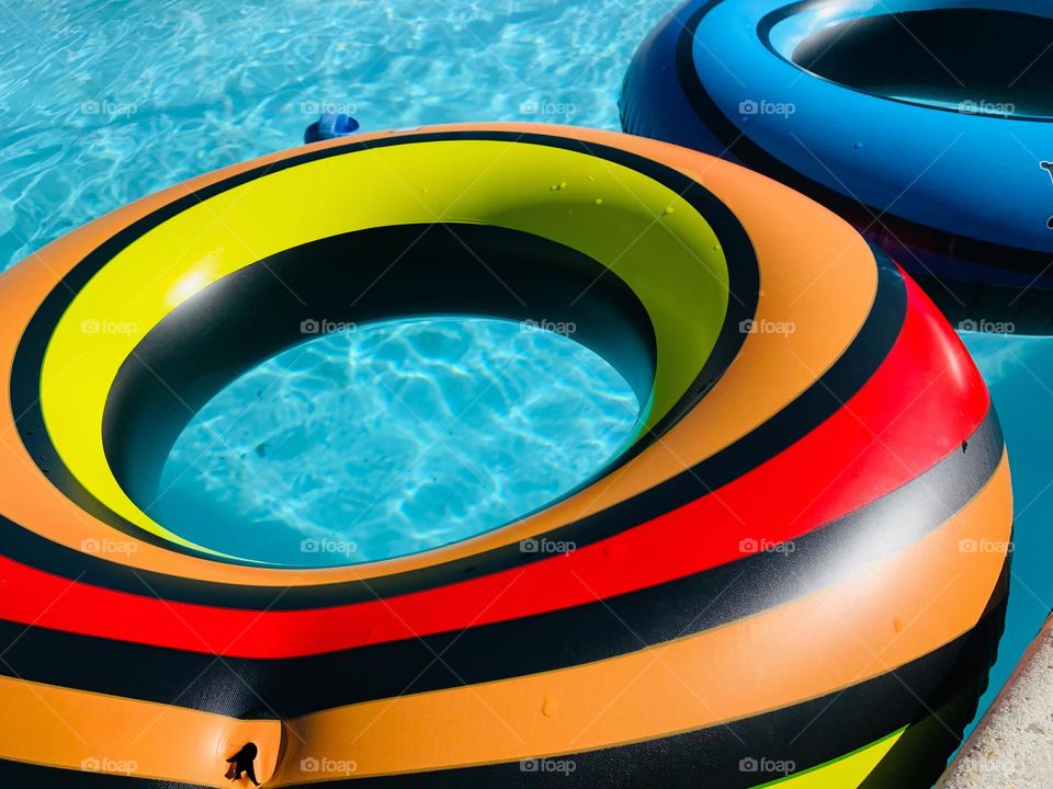 Colorful Pool Floaties Under The Sun 