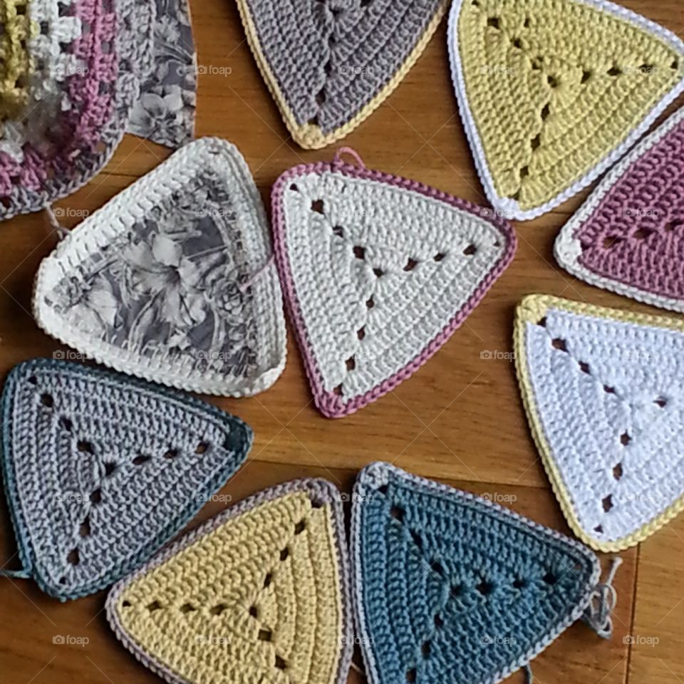 Crochet bunting. Making crochet bunting with liberty fabrics to be used in a show garden at Tatton flower show.