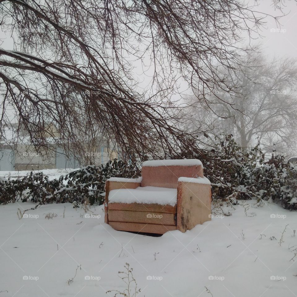 lonely old chair in winter