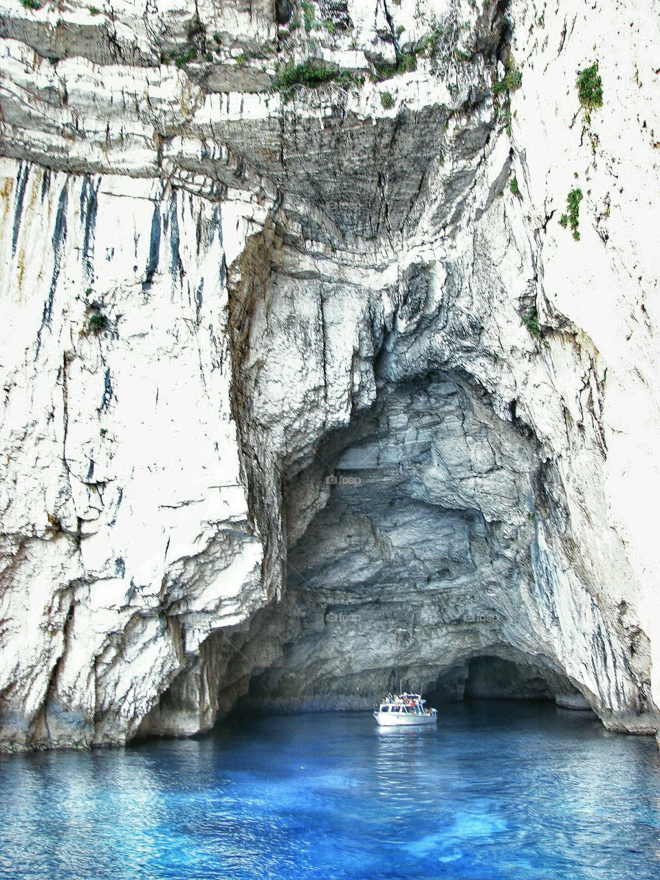 sailing. Let's go sailing- (Possejdon's cave,  Paxos Island near Corfu)