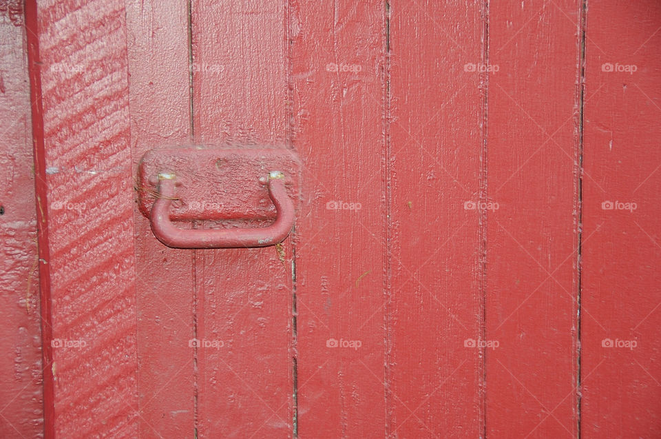 Red door on a historic old barn