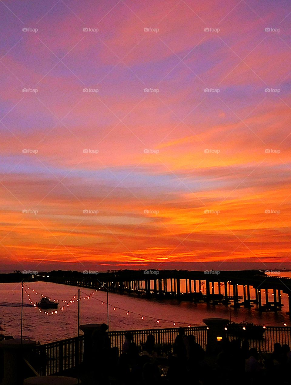 
Sunset over the bridge with its panoply of blues, bouquets of yellows, bushels of oranges, and engulfment of reds, will move through a specified choreography