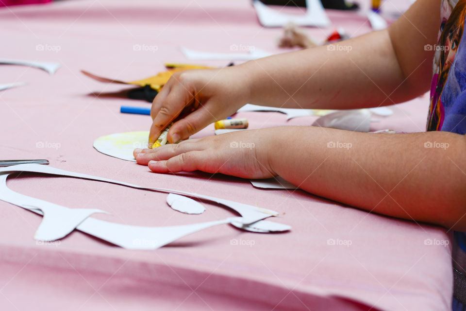 kid drawing on the table