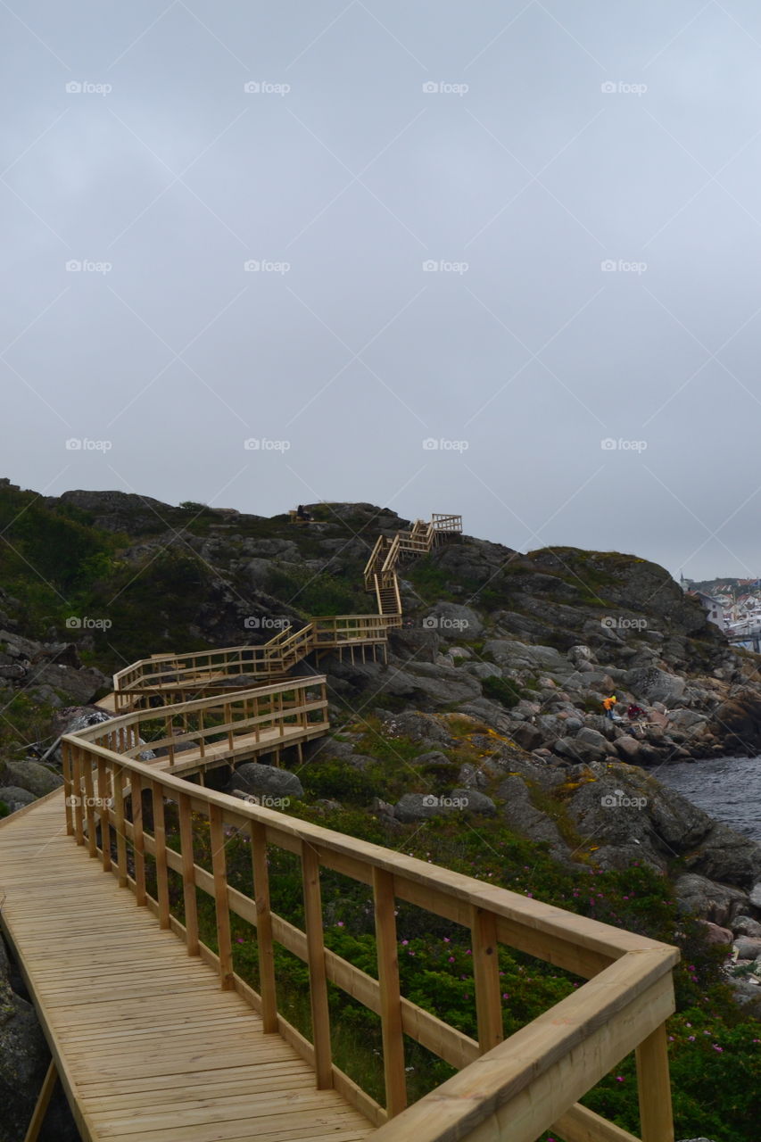 Empty boardwalk near lake