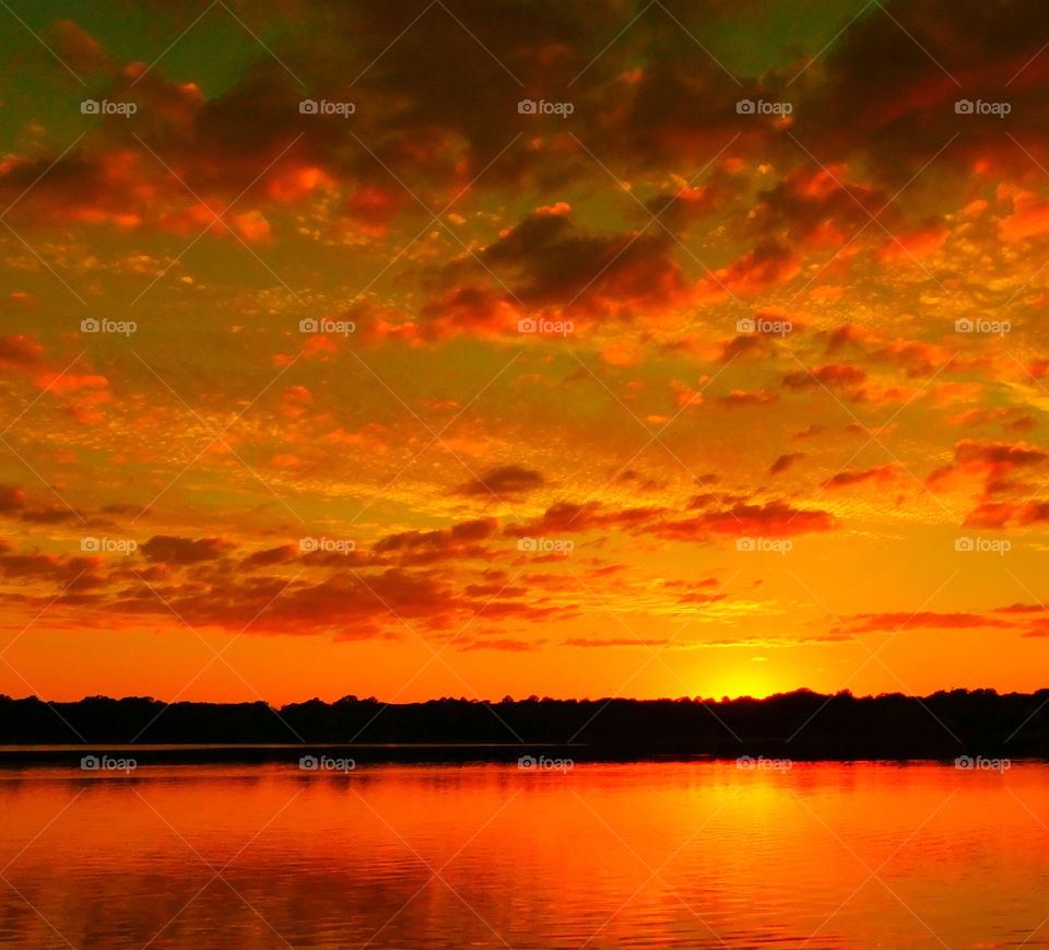 Dramatic sky over the idyllic lake