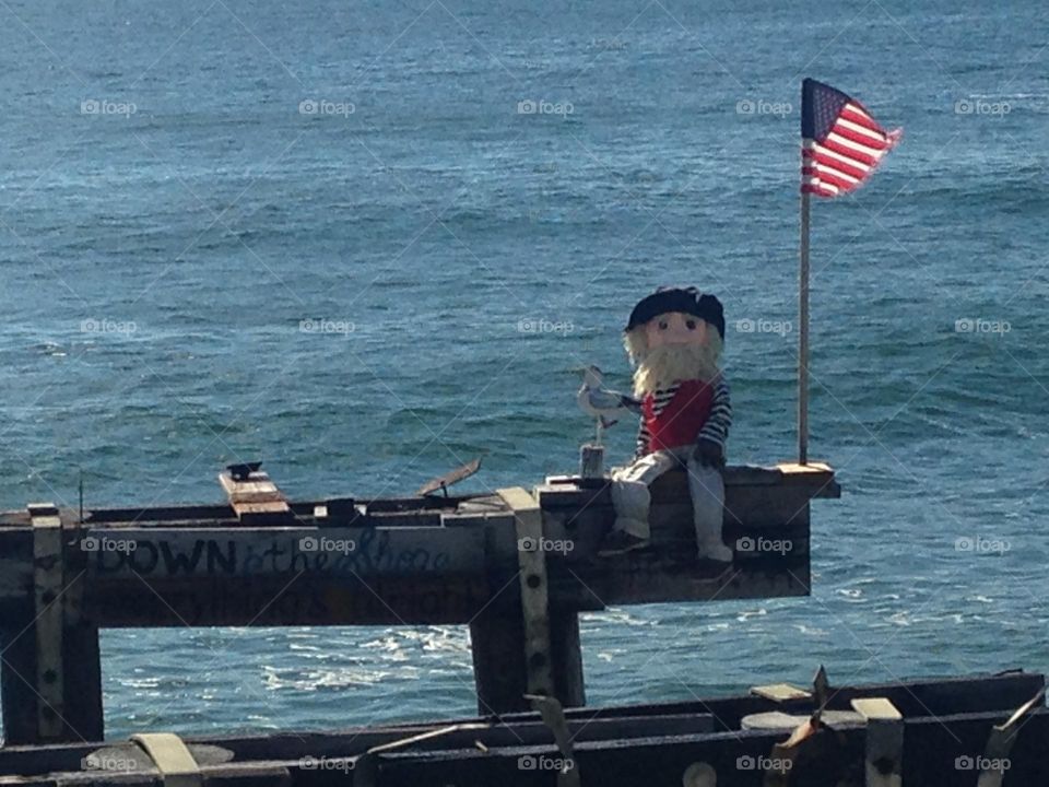 A photo of a stuffed “fisherman” named Ralph who used to be a fixture on the pier in Ocean Grove, NJ. He was next to a sign that said “ Down the Shore, everything’s alright.” Unfortunately, he washed away in a hurricane, but his memory lives on. 