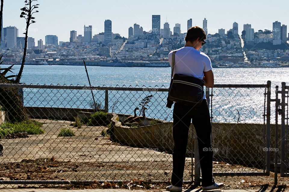 Young man and cityscape 