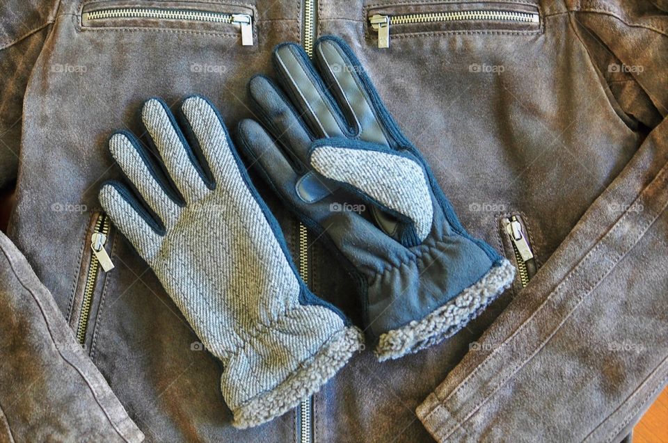 Winter gloves and leather jacket