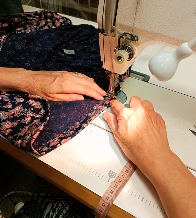 My mum during sewing a dress ❤️.
