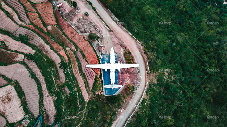 bird eye view of a airplane standing in the wild