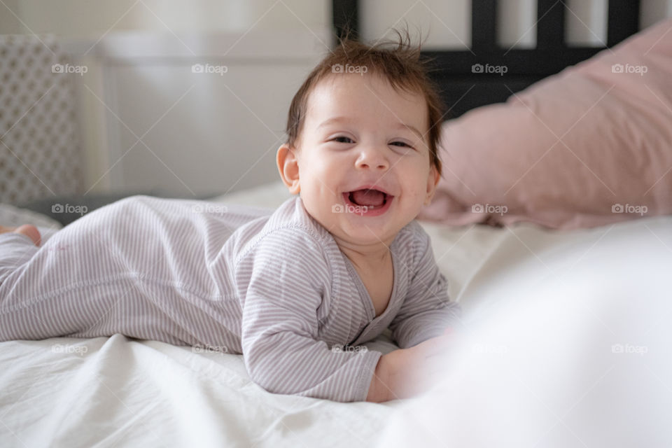 Little infant girl smiling 