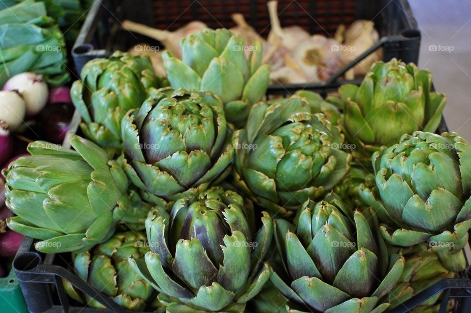 Artichokes for sale in a market