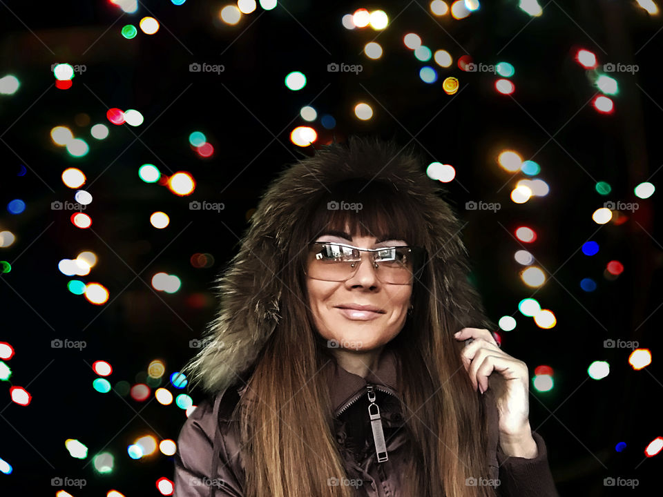 Portrait in Christmas lights 