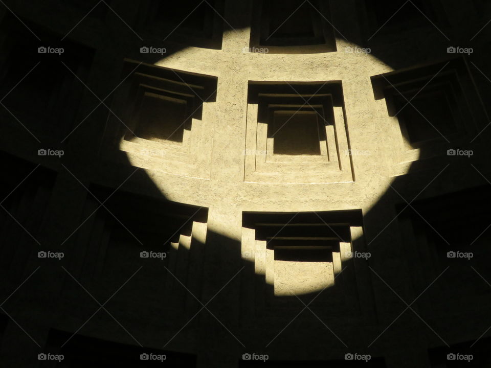 shadow of sunrays inside Pantheon's ceiling - Rome