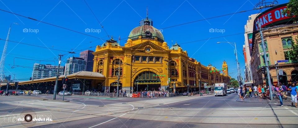 Flinders St Station during the middle of a beautiful sunny work day. Melbourne is alway rush rush rush. Just a really good capture.