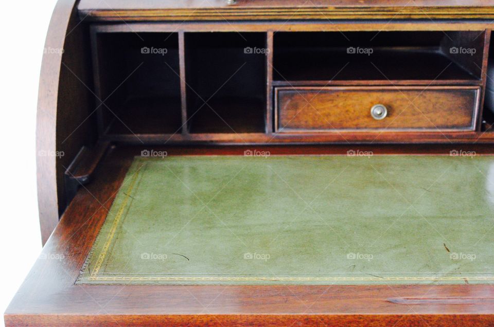 Green Color Story - green leather writing surface on a dark wooden roll-top desk