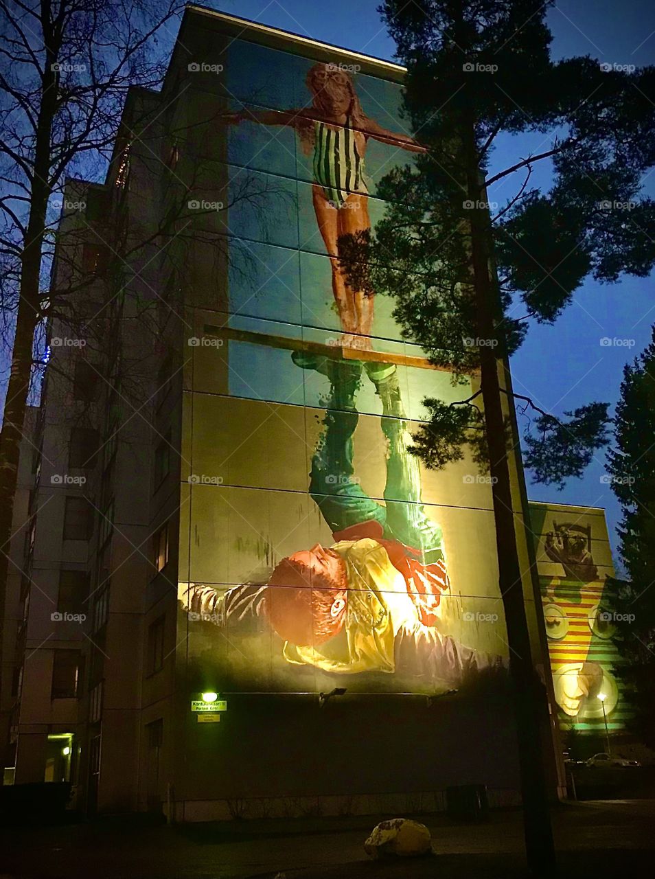 Fintan Magee mural at night, Kontula, Helsinki, Finland