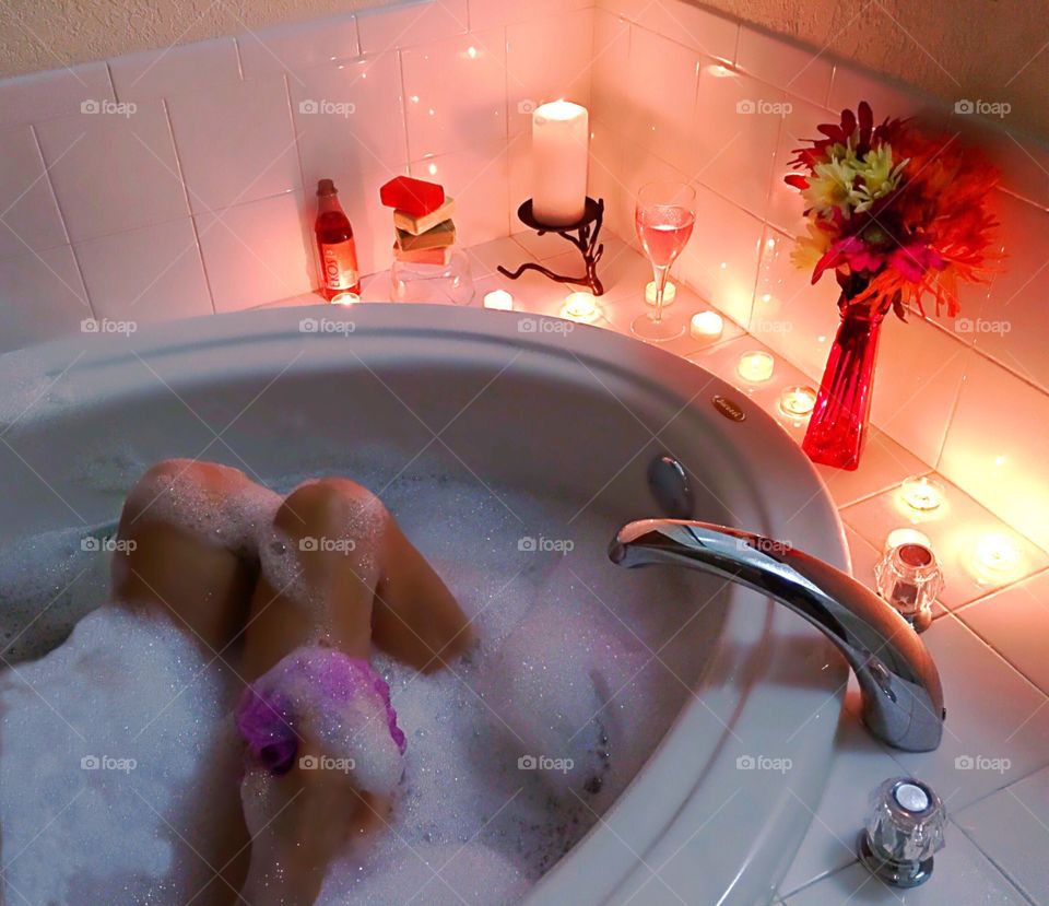Relaxing in a candlelit bubblebath to ease the mind body and spirit.