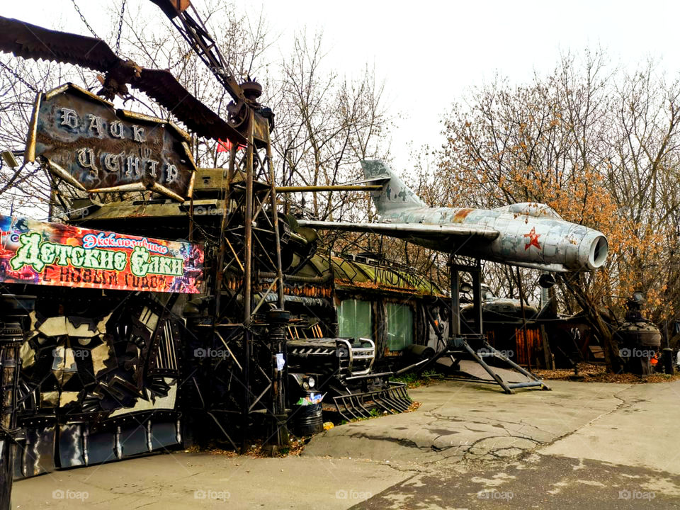 Airplane, part of a tank, part of a car bumper
