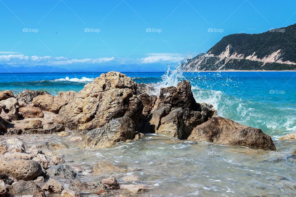 Rocky shores and bursting waves