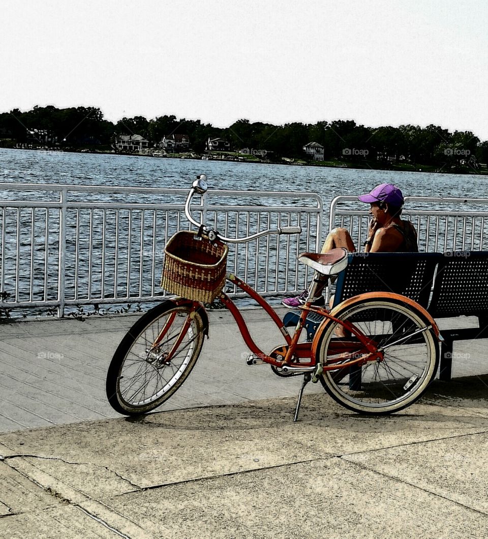 vintage bike on path by water